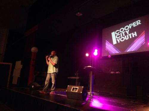 Rodrick speaking at a youth conference