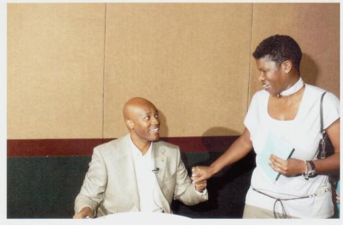 Rodrick Walters greeting one of the guests at his book signing
