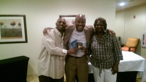 Rodrick with conference organizers